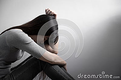 Depression woman sit on floor Stock Photo