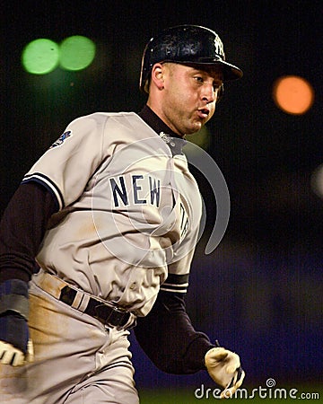 Derek Jeter rounds third base. Editorial Stock Photo