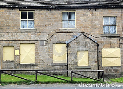 Derelict abandoned terraced housing in england Stock Photo
