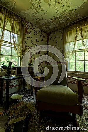 Derelict Antique Corner Chair - Abandoned House - New York Stock Photo