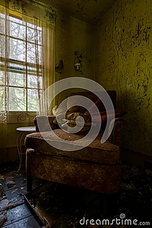 Derelict Antique Corner Chair - Abandoned House - New York Stock Photo