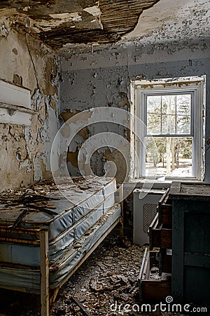 Derelict Bed in Bedroom - Abandoned Sleighton Farm School - Pennsylvania Stock Photo