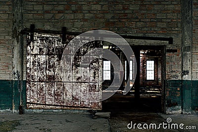 Derelict Sliding Fire Door - Abandoned Glass Factory Stock Photo