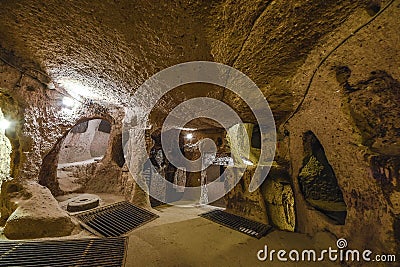 The Derinkuyu underground city is an ancient multi-level cave city in Cappadocia, Turkey. Stock Photo