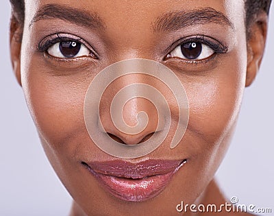 Dermatology, beauty and portrait of black woman with smile, glowing skin and natural spa makeup in studio. Happy Stock Photo