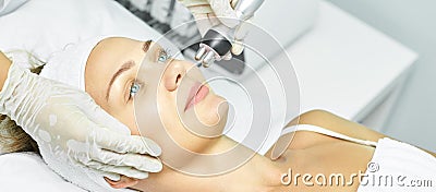 Dermatology skin care facial therapy. Medical spa anto wrinkles procedure. Woman face rejuvenation. Pretty girl. Rf cosmetician Stock Photo