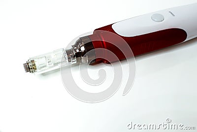 Dermis stamp electric pen. Dermapen. Needle mesotherapy treatment. Stock Photo