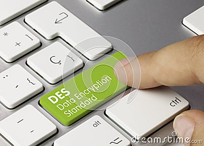 DES Data Encryption Standard - Inscription on Green Keyboard Key Stock Photo