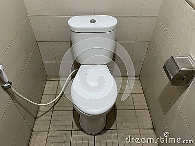 Photo of a sitting toilet. Stock Photo