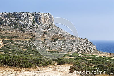 Descent to the sea along a mountain trail with a beautiful view. Peaceful landscape Stock Photo