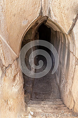 Descent to the secret exit near the main gate to the ruins of the medieval fortress Nimrod - Qalaat al-Subeiba, located near the Stock Photo