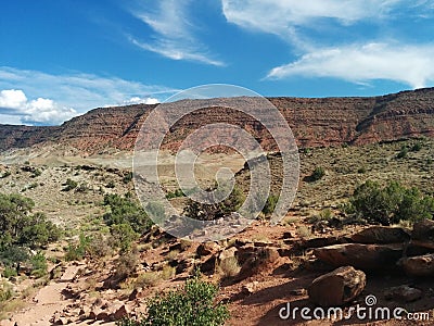 Desert landscape with mountain, sand, and brush Stock Photo