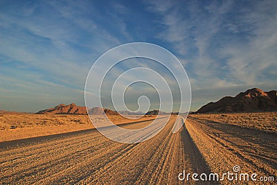 Desert landscapes with mountains and the road in the south of Namibia. Stock Photo