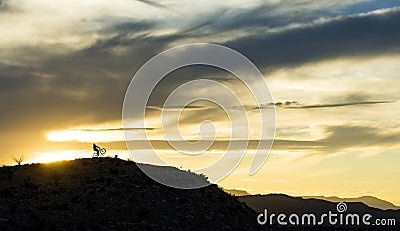 Desert sunset Riders Stock Photo