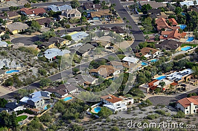 Desert Town with Swimming Pools and Homes Stock Photo