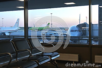 Deserted dark gloomy waiting room at the terminal departure Pulkovo airport late in the evening Editorial Stock Photo