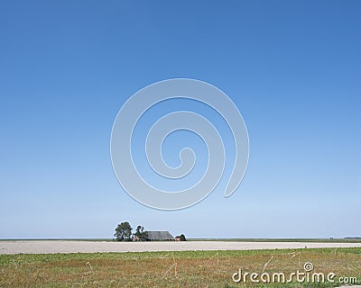 Deserted farm in the north of dutch province groningen on sunny summer day Editorial Stock Photo