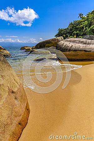 Deserted and unspoilt beach Stock Photo