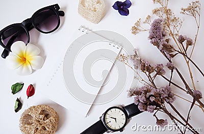Design background template With notebooks, glasses, paper, clocks and dried flowers Stock Photo