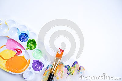 Design concept - Preparing for Easter celebration, painting Easter eggs with colorful Acrylic pigment color dyestuff in palette, Stock Photo