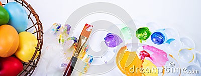 Design concept - Preparing for Easter celebration, painting Easter eggs with colorful Acrylic pigment color dyestuff in palette, Stock Photo