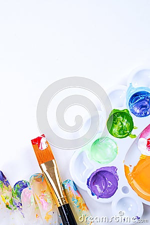 Design concept - Preparing for Easter celebration, painting Easter eggs with colorful Acrylic pigment color dyestuff in palette, Stock Photo