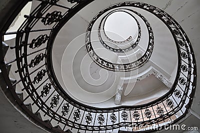 Design spiral staircase inside an old building, circular architectural shape. Spiral stairs. Stock Photo