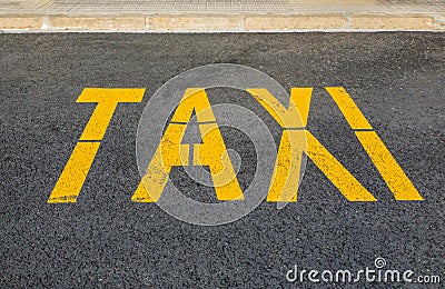 Designation of the taxi rank on the yellow paint asphalt Stock Photo