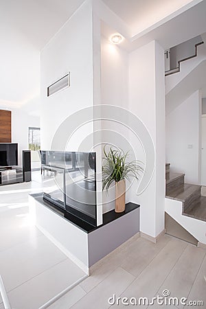 Designed fireplace in contemporary apartment Stock Photo