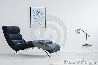 Designed small table with black lamp Stock Photo