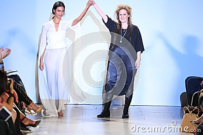 Designer Andrea Wild and model walk Wild runway at the FTL Moda Spring 2016 Editorial Stock Photo