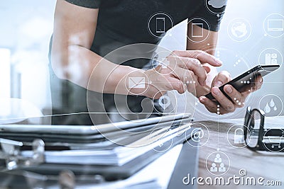 Designer hand using mobile payments online shopping,omni channel Stock Photo