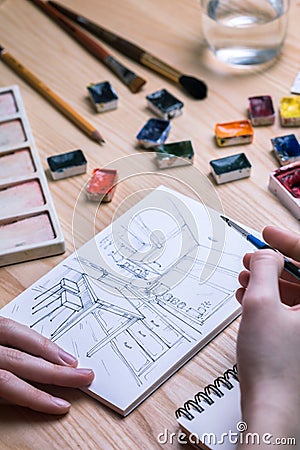 Designer makes a sketch of the kitchen interier Stock Photo