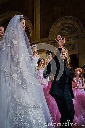 Designer Reem Acra greets the audience after the Reem Acra Bridal Spring 2020 fashion collection Editorial Stock Photo