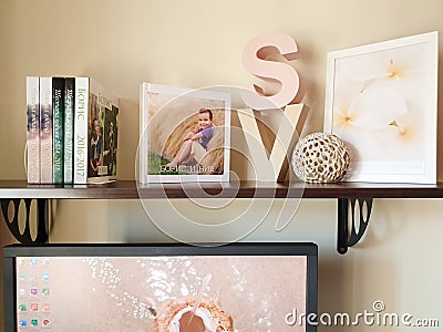 Designer shelf home office of a photographer with photobooks Stock Photo