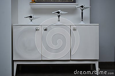 designer and unique royal white laminated furniture set with two opening door Stock Photo