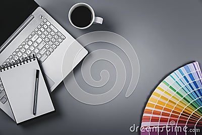 Designer workplace with color palette and laptop. top view with Stock Photo