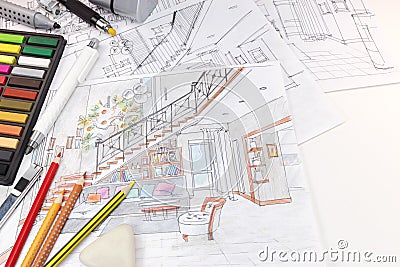 Designers desk with drawing tools and sketches of living room in Stock Photo