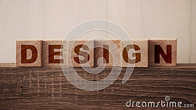 Design Word on Wooden Cubes. Branding redesign rebranding marketing concept Stock Photo