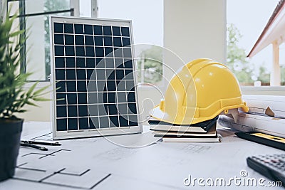 Desk of architects Solar Energy Powered Home Green for reduce global warming Stock Photo