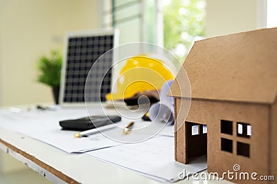 Desk of architects Solar Energy Powered Home Green for reduce global warming Stock Photo