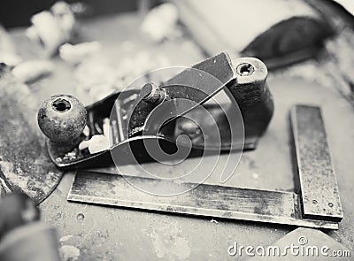 Desk of a carpenter with some tools Stock Photo