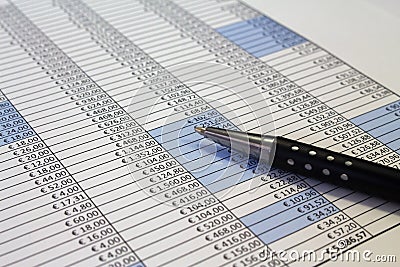 Desk with financial charts and histograms Stock Photo