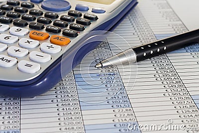 Desk with financial charts and histograms Stock Photo