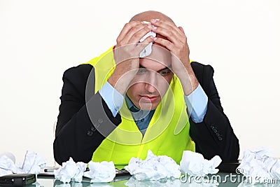 Desk full of screwed up paper Stock Photo