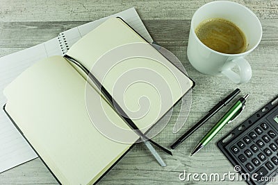 Desk with notepad, ballpoint pen Stock Photo