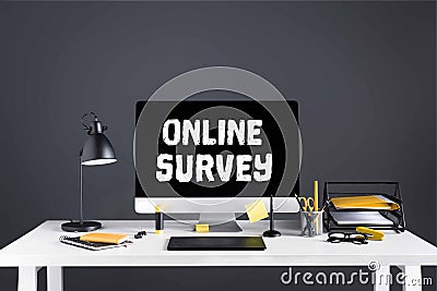 desktop computer with online survey inscription on screen, graphics tablet and office supplies Stock Photo