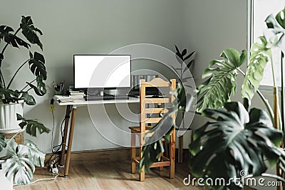Desktop workspace with connect to laptop with HDMI cable split screen mock up monitor leaving space for text And stacks of books Stock Photo