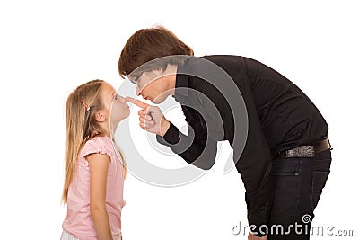 Despairing father pointing finger at his daughter Stock Photo