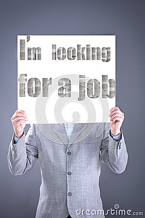 Desperate businessman looking for a job Stock Photo